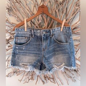 Distressed denim shorts.  Size 25.